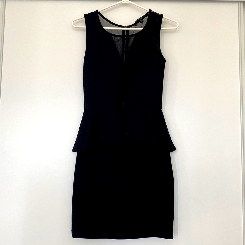 Black dress. Fitted. Mesh back and front v-neck is also mesh